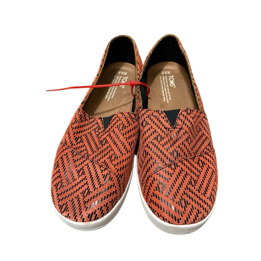 TOMS Orange and Black Patterned Slip-On Shoes